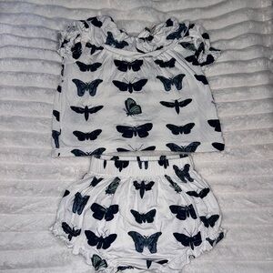 Kate Quinn Navy and White Moth Outfit